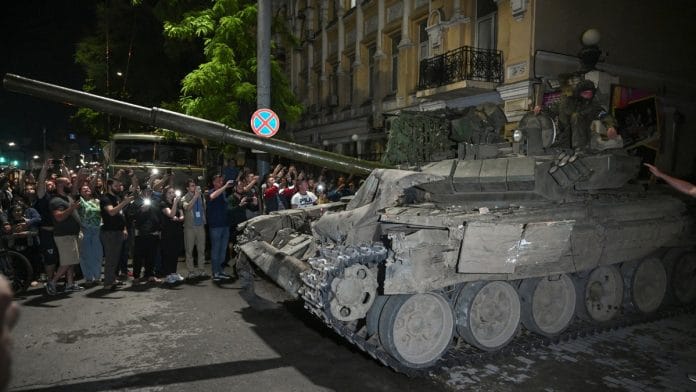 Fighters of Wagner private mercenary group pull out of the headquarters of the Southern Military District to return to base, in the city of Rostov-on-Don, Russia, Saturday | Reuters