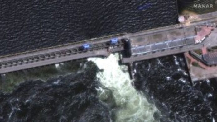 A satellite image shows Nova Khakovka Dam in Kherson region, Ukraine, on 5 June 2023 | Maxar Technologies/Handout via Reuters
