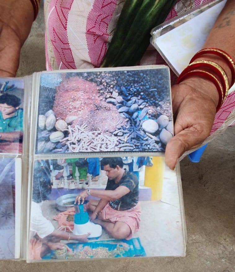 Mimi shows pictures of how the tribe had traditionally made these herbal medicines | Sharan Poovanna | ThePrint 