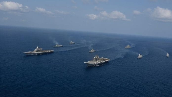 INS Vikramaditya and INS Vikrant sailing with their fleets as part of the Navy's mission to showcase its capability and power, in the Arabian Sea Saturday | By special arrangement