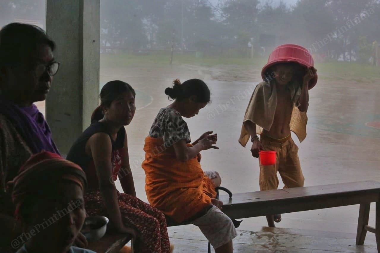 It is raining in Manipur right now, making it more difficult for people. Kukis are using all sorts of alternatives to cover themselves in the rain Photo: Praveen Jain | ThePrint