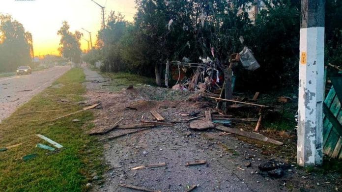 A crater left by remains of a shot down suicide drone, which local authorities consider to be Iranian made unmanned aerial vehicles (UAVs) Shahed-131/136, is seen amid Russia's attack on Ukraine, in Kyiv Region | Handout via Reuters