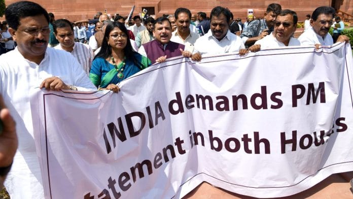 Opposition parties (I.N.D.I.A) alliance MPs including Sanjay Singh and others protest at the premises of Parliament, demanding PM Modi's statement on Manipur ethnic violence in both houses, during the ongoing Monsoon Session, in New Delhi | ANI