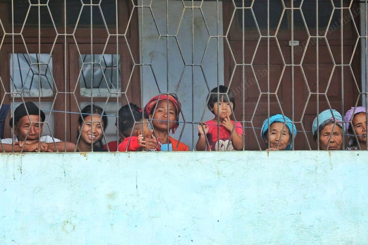 All of them stand in the corridor and look outside Photo: Praveen Jain | ThePrint