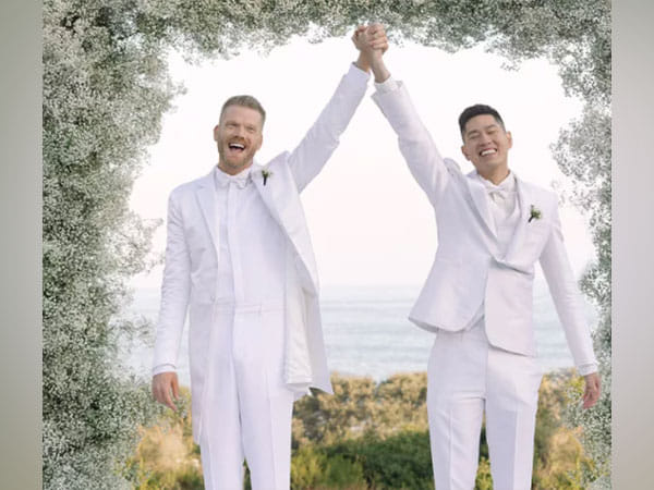Pentatonix's Scott Hoying ties knot with Mark Manio in star-studded black tie ceremony