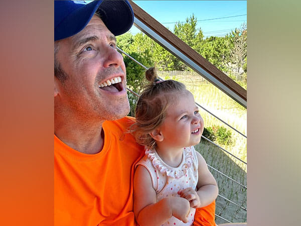 Andy Cohen posts adorable picture with daughter, says, “Summer Lovin”