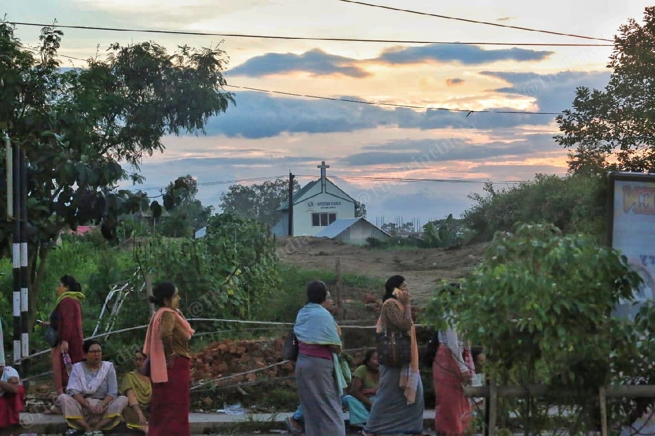 Meitei women in front of a church frequented by Kukis | Photo: Praveen Jain | ThePrint