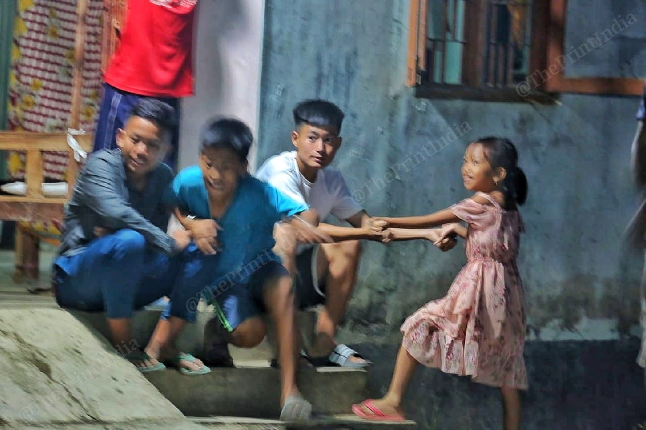 In evening, kids sit outside to play | Photo: Praveen Jain | ThePrint