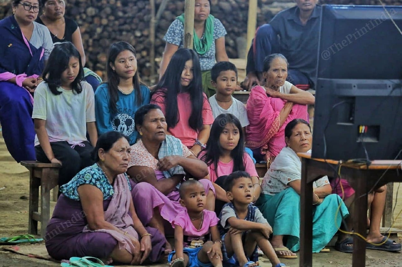 Kids watching television at the camp | Photo: Praveen Jain | ThePrint