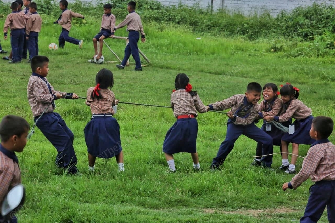 Children play different games together. There is no sign of tension between these kids | Photo: Praveen Jain | ThePrint