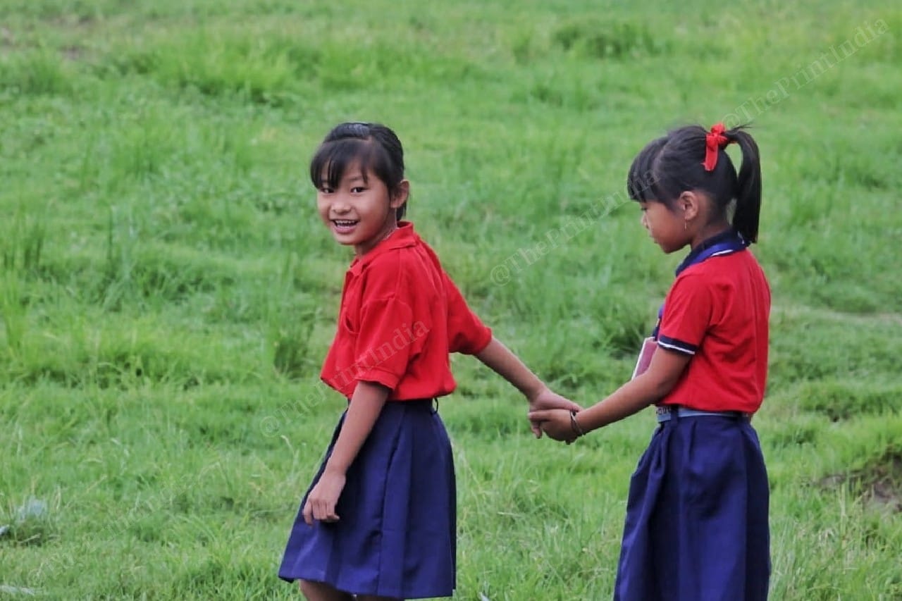Naroem student from Imphal ( left) and Thoibi from Moreh playing together in the school | Photo: Praveen Jain | ThePrint