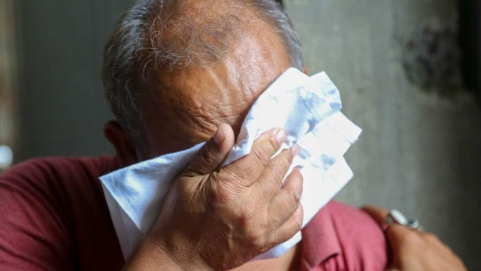 Father of the missing girl breaks down while talking about his daughter | Photo: Suraj Singh Bisht, ThePrint