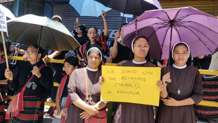 Civil society organisations stage a demonstration to express solidarity with the Zo people in ethnic strife-torn Manipur, in Aizawl on Tuesday | ANI