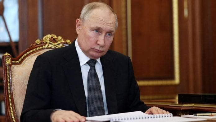 Russian President Vladimir Putin listens to Central Election Commission (CEC) Chairwoman Ella Pamfilova during a meeting in Moscow, Russia, July 3, 2023 | Reuters