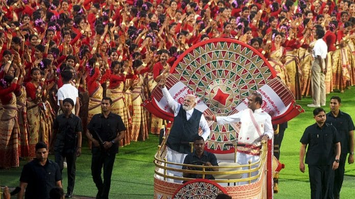 Prime Minister Narendra Modi and Assam Chief Minister Himanta Biswa Sarma during a Bihu programme at Sarusajai Stadium in Guwahati in April | ANI