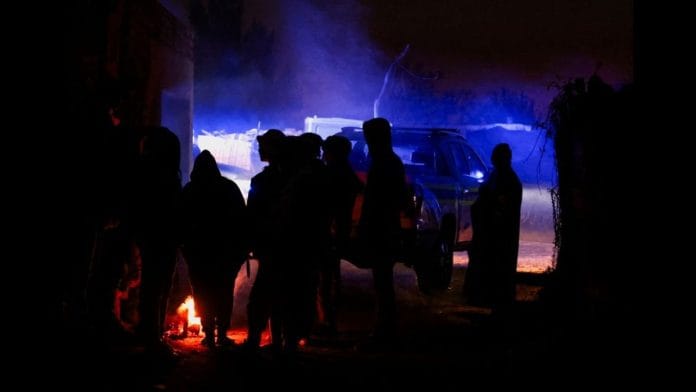 Onlookers gather at the scene following a suspected gas leak in the Angelo shack settlement, near Boksburg, east of Johannesburg, South Africa, on 6 July 2023 | Reuters/Siphiwe Sibekos illegal mining