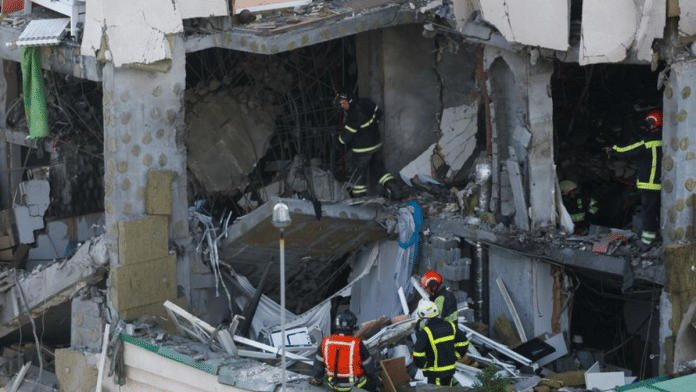 Rescuers work at the site of an apartment building damaged during Russian missile strikes, amid Russia’s attack on Ukraine, in Kyiv, Ukraine June 24, 2023 | Reuters