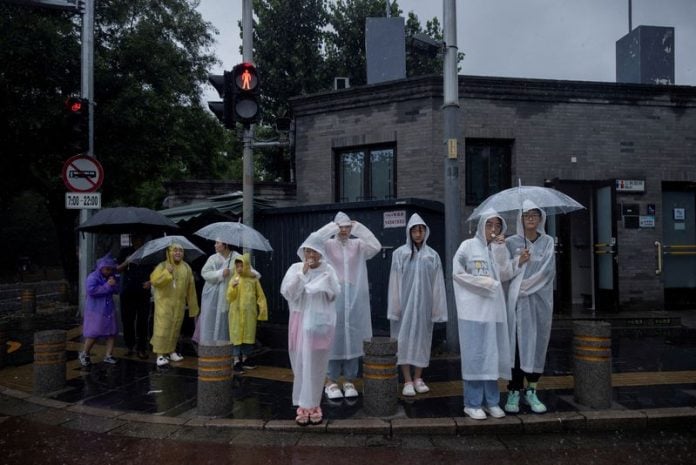 Thousands flee homes as heavy rain lashes China after Typhoon Doksuri ...