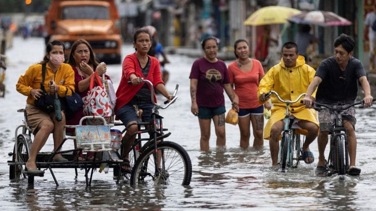 Power lines cut, factories and schools shut as Typhoon Doksuri reaches China