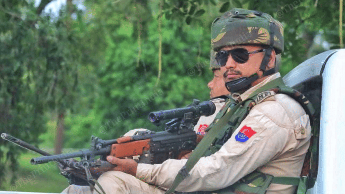 File photo of Manipur Police personnel patrolling a road in Imphal | Representational image | Praveen Jain | ThePrint