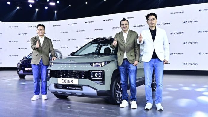 Unsoo Kim, MD & CEO, Hyundai Motor India Ltd., Tarun Garg, COO, Hyundai Motor India Ltd., Mr. J.T. Park, Executive Director (Sales, Marketing, and Service), Hyundai Motor India Ltd. at the launch of Hyundai Exter in New Delhi on 10 July | Photo: Hyundai