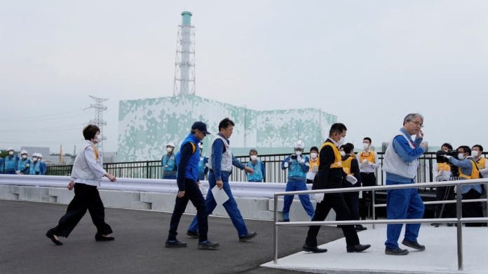 File photo of IAEA Director General Rafael Mariano Grossi, (second from left), at Fukushima nuclear power plant | Hiro Komae/Pool via Reuters
