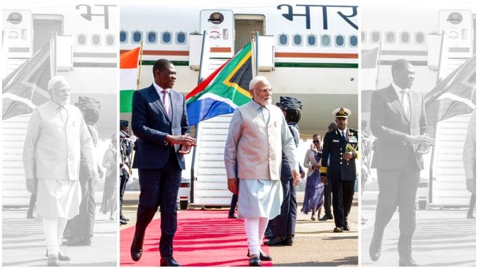 Prime Minister Narendra Modi at Waterkloof Air Force Base with South African Deputy President Paul Mashatile Tuesday | ANI