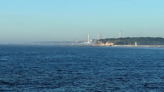 A view of the Fukushima Daiichi nuclear power plant after it started releasing treated radioactive water into the Pacific Ocean, seen from the nearby Ukedo fishing port in Namie town, Fukushima Prefecture, Japan | Reuters