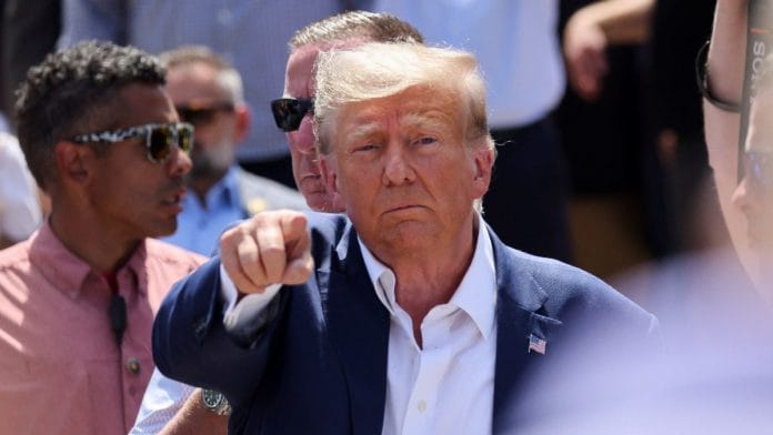Republican presidential candidate and former U.S. President Donald Trump campaigns at the Iowa State Fair in Des Moines, Iowa | Reuters
