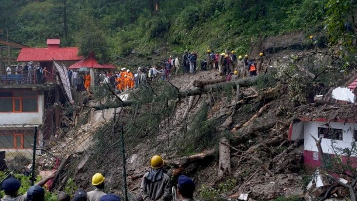 Rescue workers remove the debris as they search for survivors after a landslide following torrential rain in Shimla in the northern state of Himachal Pradesh, India, August 14, 2023 | Reuters