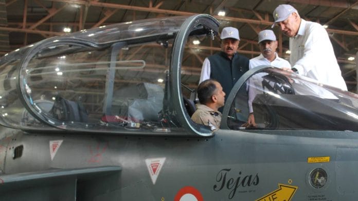 Members of the Consultative Committee for Defence at HAL’s LCA Tejas Division in June | Twitter/@HALHQBLR