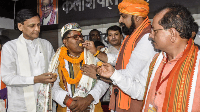 Bihar BJP leader Hari Sahni being offered sweets by party state chief Samrat Chaudhary after being nominated as the State Legislative Council leader, in Patna Sunday | ANI