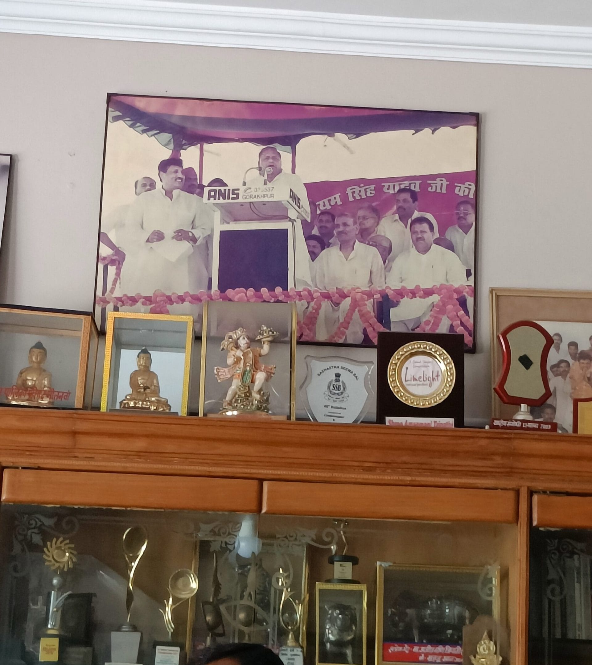 A photograph at Amarmani Tripathi's residence shows him with Mulayam Singh Yadav at a political rally | Photo: Krishan Murari/ ThePrint