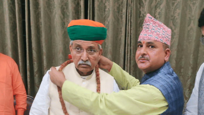 NJP's Khem Nath Acharya greeting Union Minister Arjun Ram Meghwal | By special arrangement