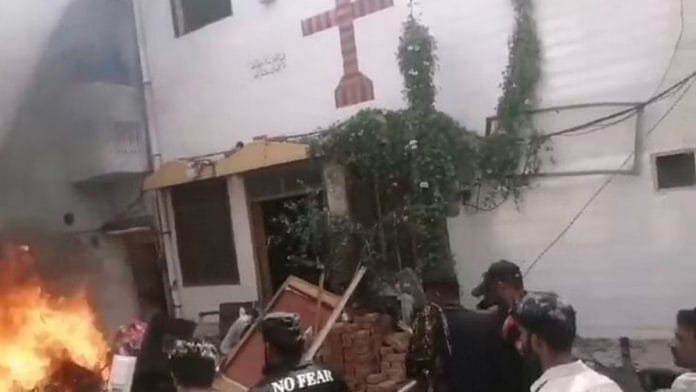 Mobs reduced churches to ashes in Jaranwala | Photo: ANI