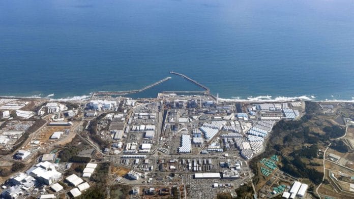 An aerial view shows the storage tanks for treated water at the tsunami-crippled Fukushima Daiichi nuclear power plant in Okuma town, Japan | Reuters