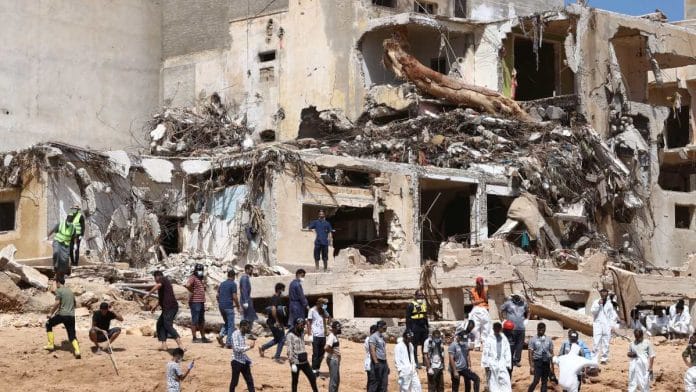 Search and rescue personnel work following fatal floods in Derna, Libya | Reuters