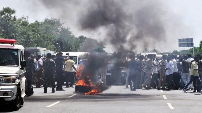 Telugu Desam Party (TDP) supporters burn tyre during their protest against the arrest of former Andhra Pradesh Chief Minister and party chief N. Chandrababu Naidu, in Prakasam on Saturday | ANI