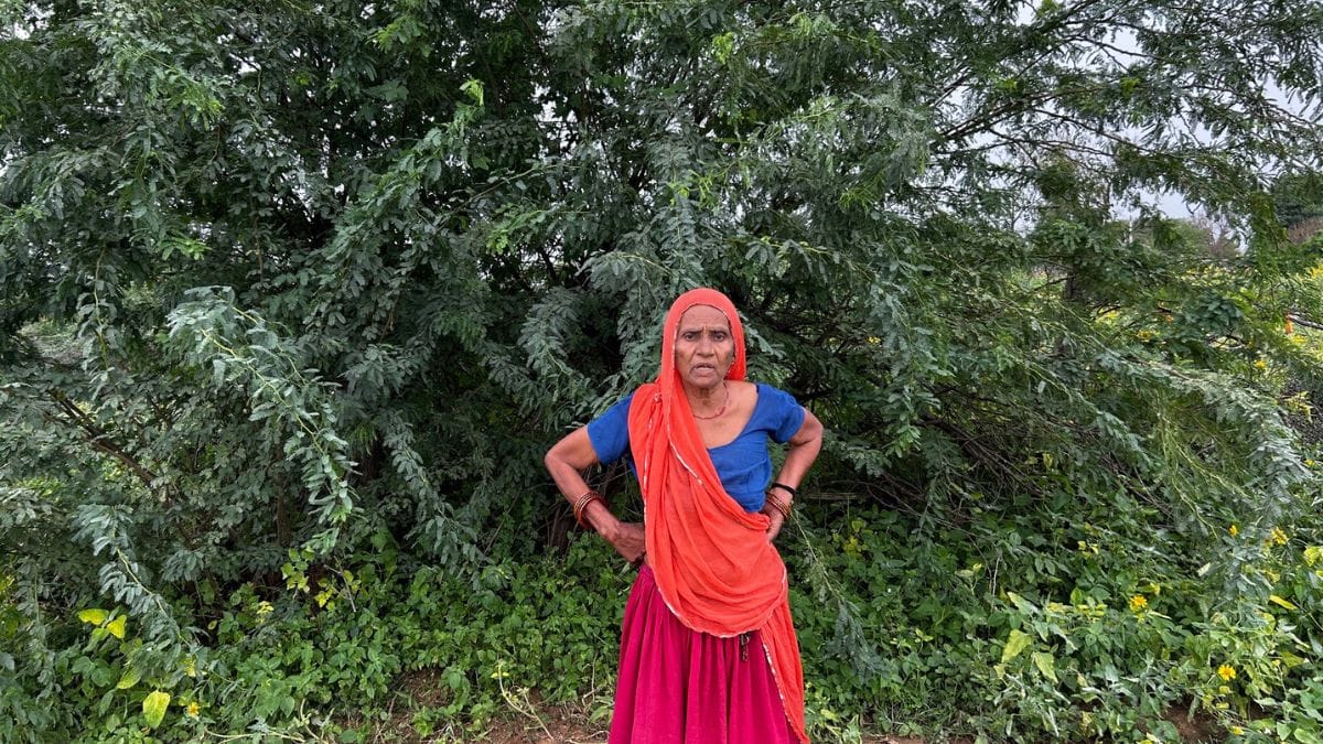 Bhanwari Devi stands at the spot where she was gang-raped. She lives in the same village as the accused. She saw them build houses, get jobs, marry off their children, and regain their social standing while she was boycotted. | Photo: Jyoti Yadav | ThePrint