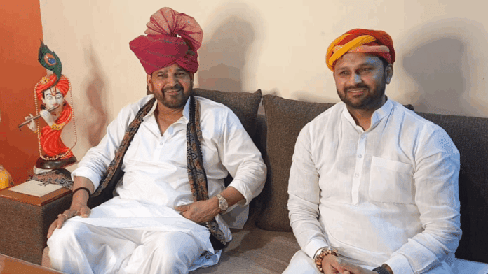 Brij Bhushan Sharan Singh with Haryana Wrestling Association vice-president Ramesh Bohar at the latter's residence in Bohar village of Rohtak, Wednesday | By special arrangement