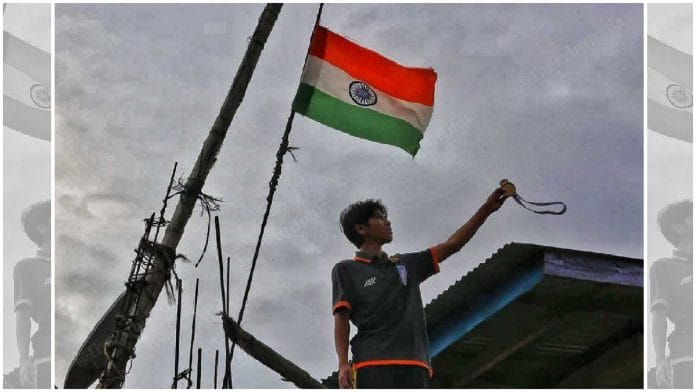 Ngamgouhou Mate, 14, led the Indian team that won the South Asian Football Federation (SAFF) U-16 Championship trophy earlier this month. Seen here with his medal at a relief camp in Kangpokpi | Praveen Jain | ThePrint