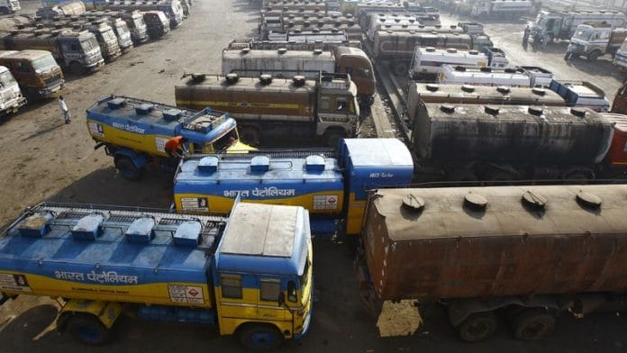 Oil tankers are seen parked at a yard outside a fuel depot on the outskirts of Kolkata February 3, 2015/Reuters