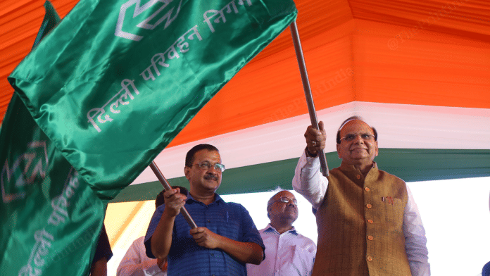 Delhi Lieutenant Governor V.K. Saxena along with Chief Minister Arvind Kejriwal flag-off 400 new electric buses at IP Depot, in New Delhi on Wednesday. | Suraj Singh Bisht | ThePrint