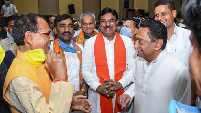 Madhya Pradesh CM Shivraj Singh Chouhan (left) greets state Congress leader Kamal Nath | Photo: PTI