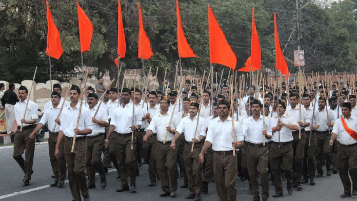 RSS members march with the saffron flag | Representational image | Commons