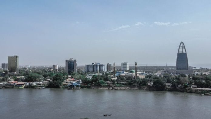 Sudan landmark skyscraper over River Nile | Commons