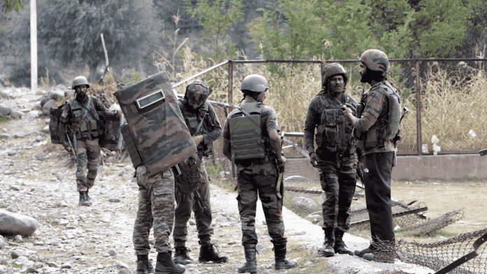 Army personnel stand guard at the site where an encounter took place between security forces and militants, in the Kokernag area of Anantnag, Wednesday | ANI