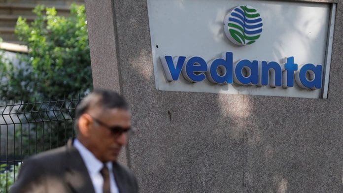 A man walks past the logo of Vedanta outside its headquarters in Mumbai, India | Reuters/Danish Siddiqui/File Photo