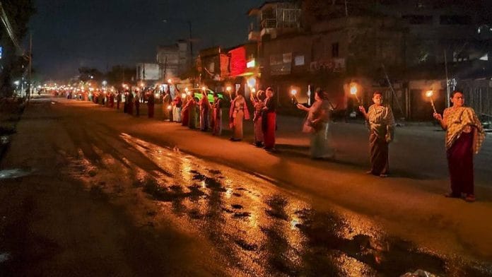 Women form a human chain in Imphal to protest against the ethnic violence between Meitei and Kuki community people in Manipur in June | Photo: PTI