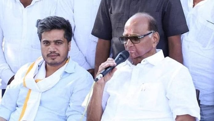 File photo of Sharad Pawar with grand-nephew Rohit Pawar. | Facebook: Rohit Rajendra Pawar